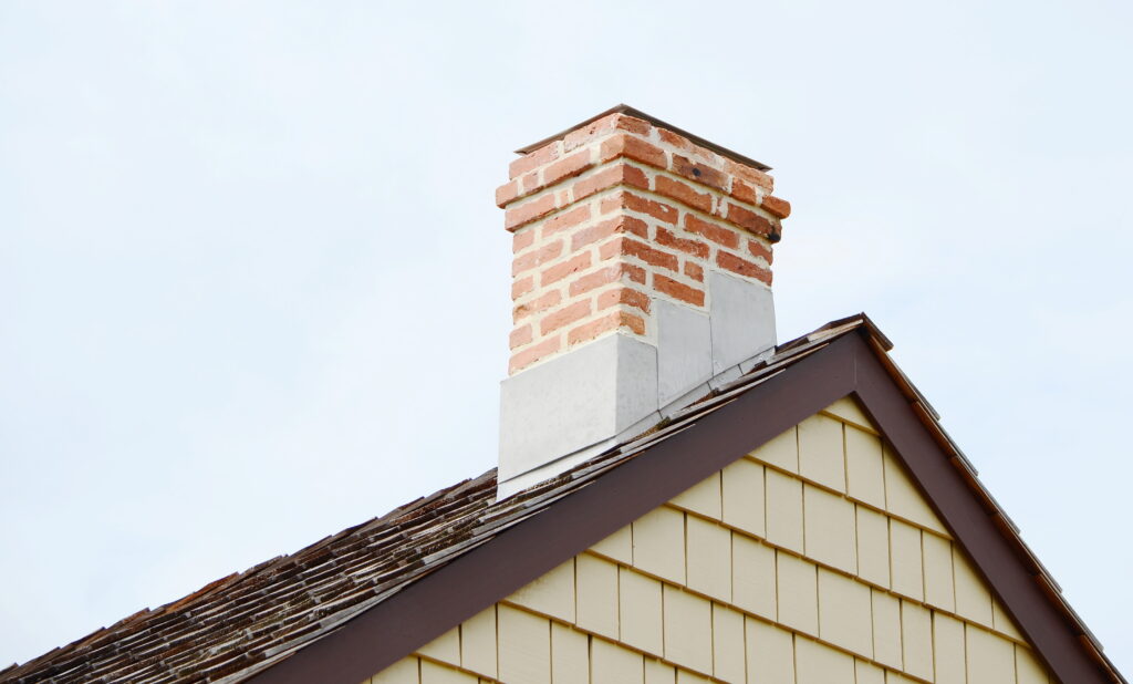 CloseUpChimneyOnTheRoof - Capitol Chimney + Fireplace Services